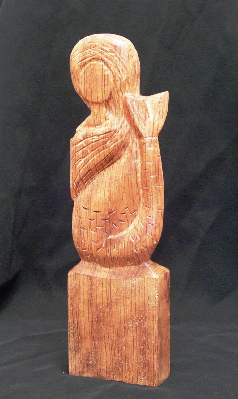 wooden carved mermaid